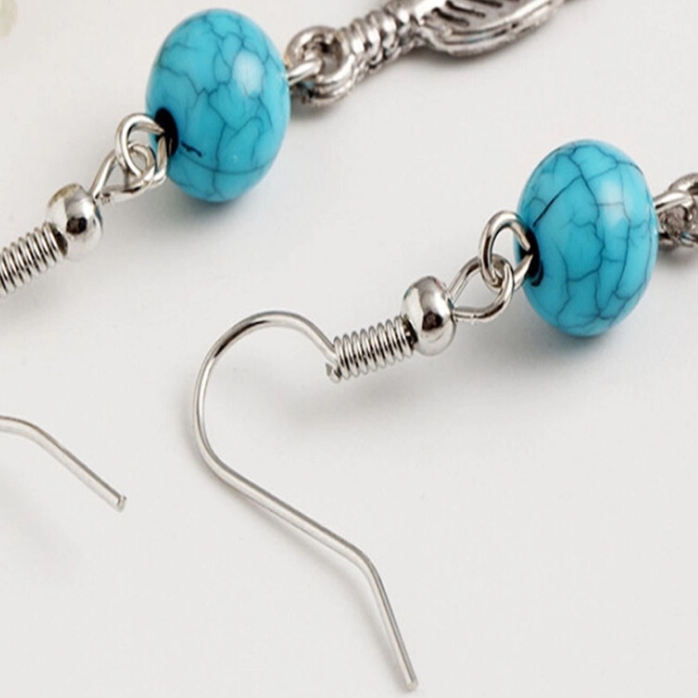 Feather Earrings - Picture 2 of 3